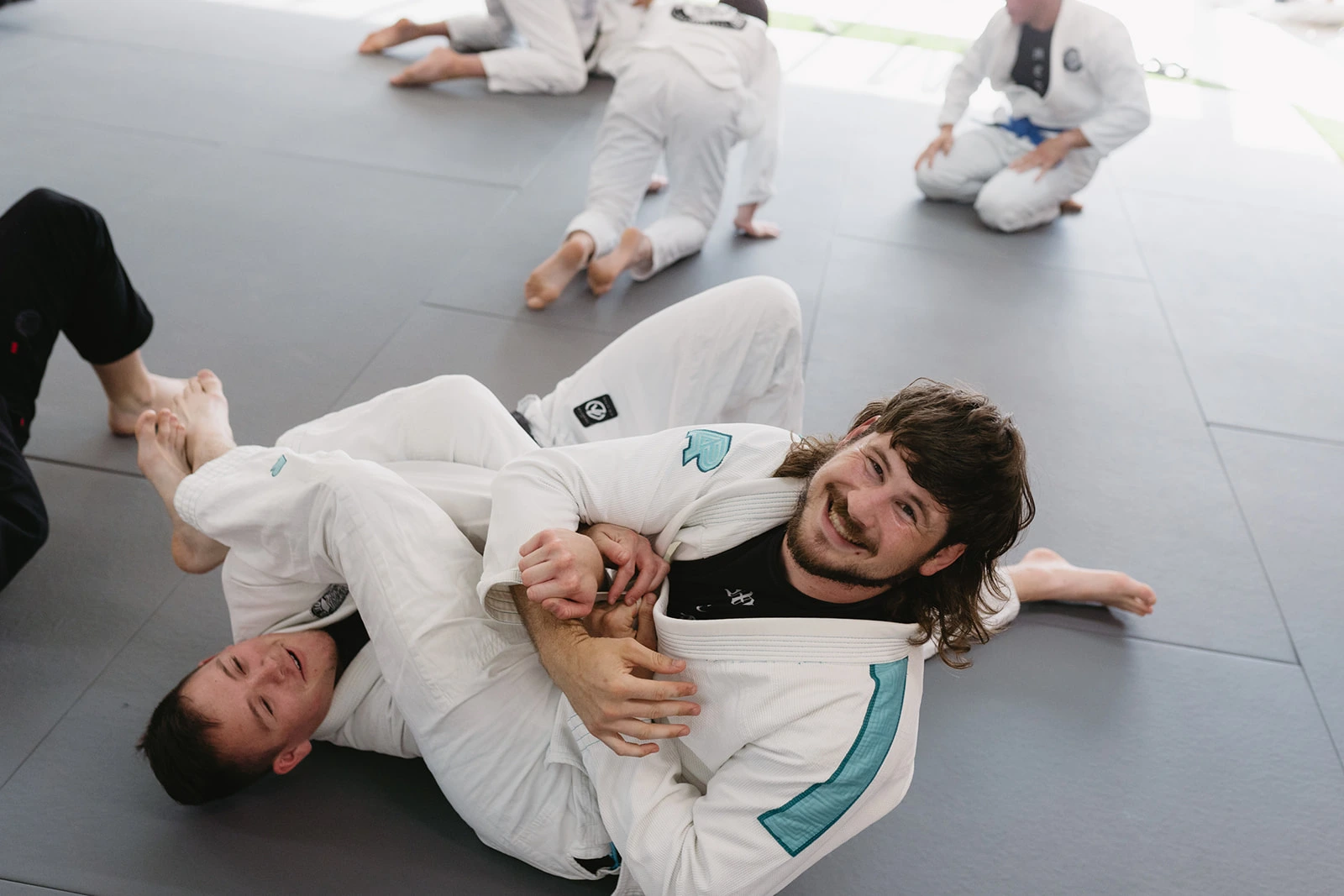 Students training at Method Jiu-Jitsu