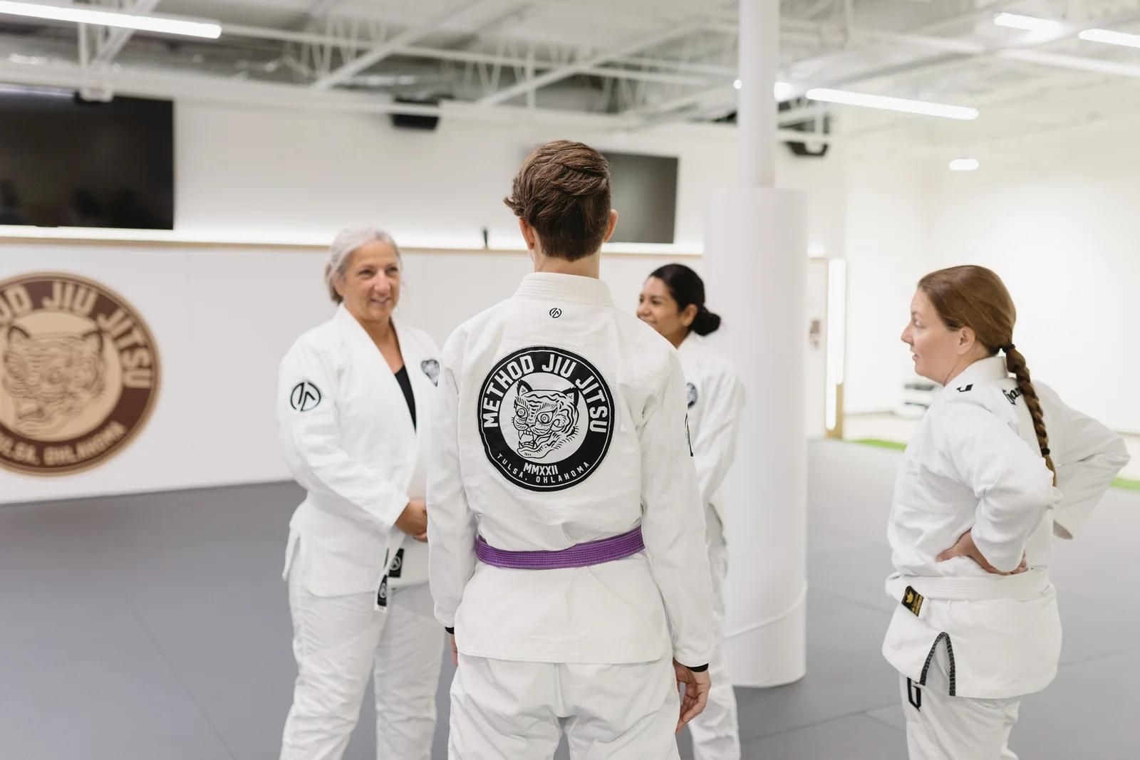 Women training together in Brazilian Jiu-Jitsu gis at Method Jiu-Jitsu in Tulsa, Oklahoma
